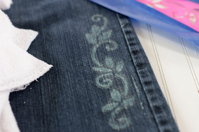 Give your plain jeans some personality by using a stencil and bleach to add some modern tattoo-like designs