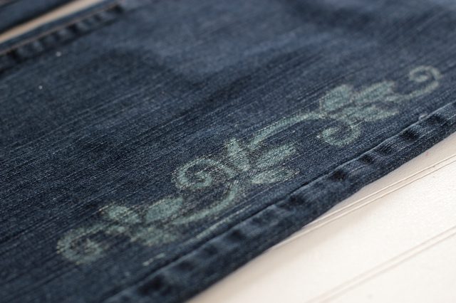 Give your plain jeans some personality by using a stencil and bleach to add some modern tattoo-like designs