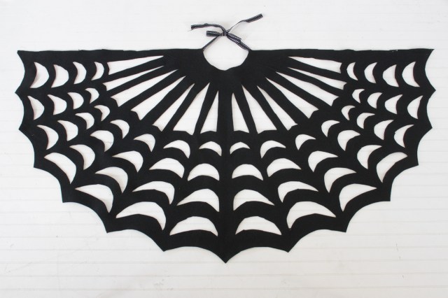 finished diy spider web poncho
