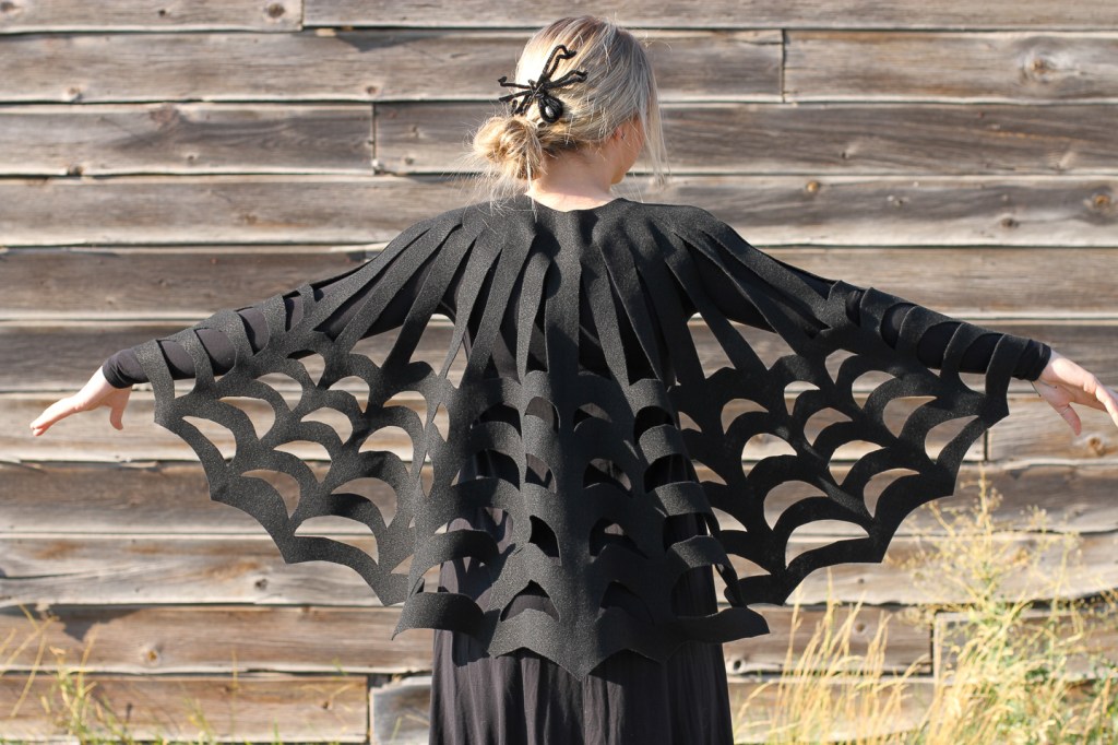 finished diy spider web cape