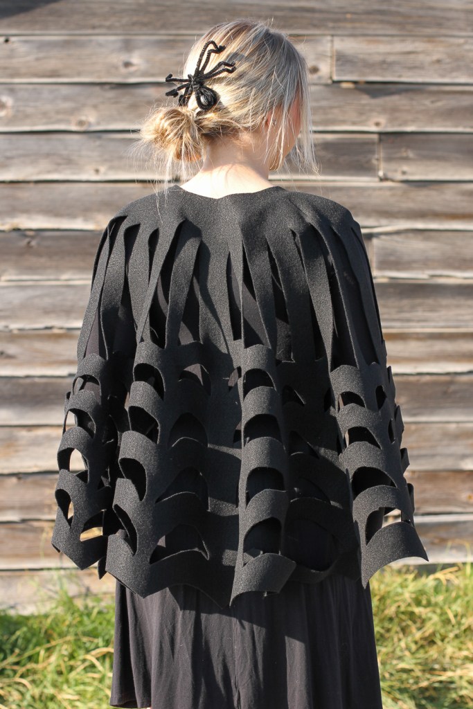 finished diy spider web cape