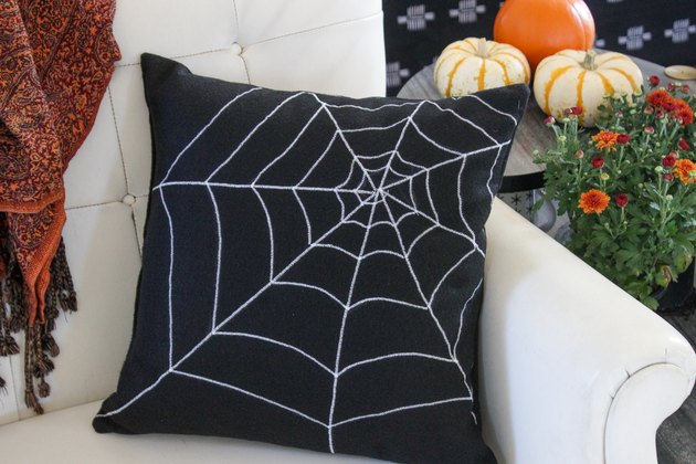 finished spider web pillow
