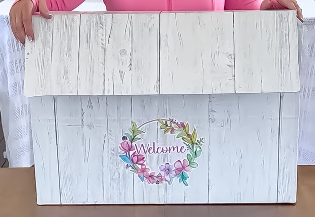 Front of a modern cardboard fold-out Barbie house based on the 1962 version