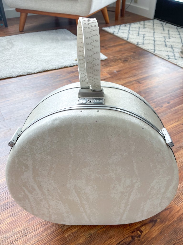 Vintage suitcase to use for a dollhouse