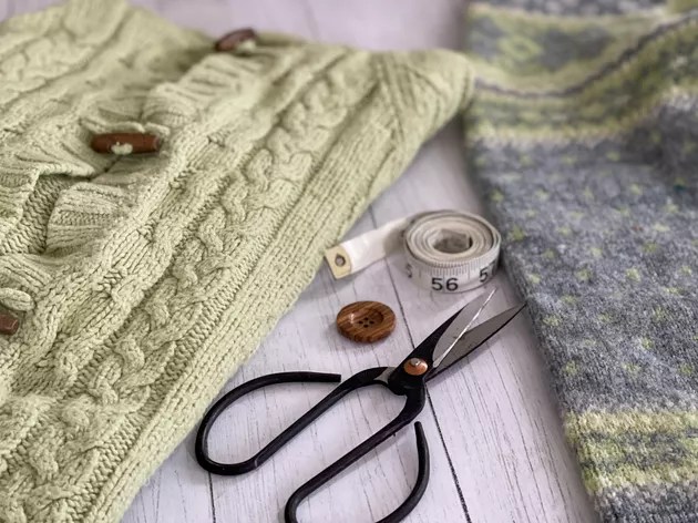 Materials needed to make a mug cozy from an old sweater